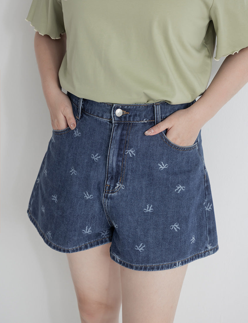Playful All-Over Bow Plus Size Denim Shorts
