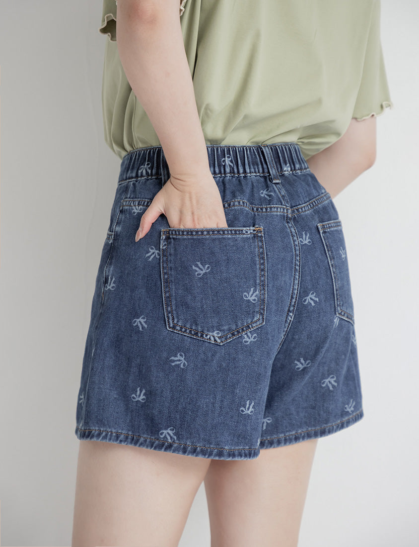 Playful All-Over Bow Plus Size Denim Shorts