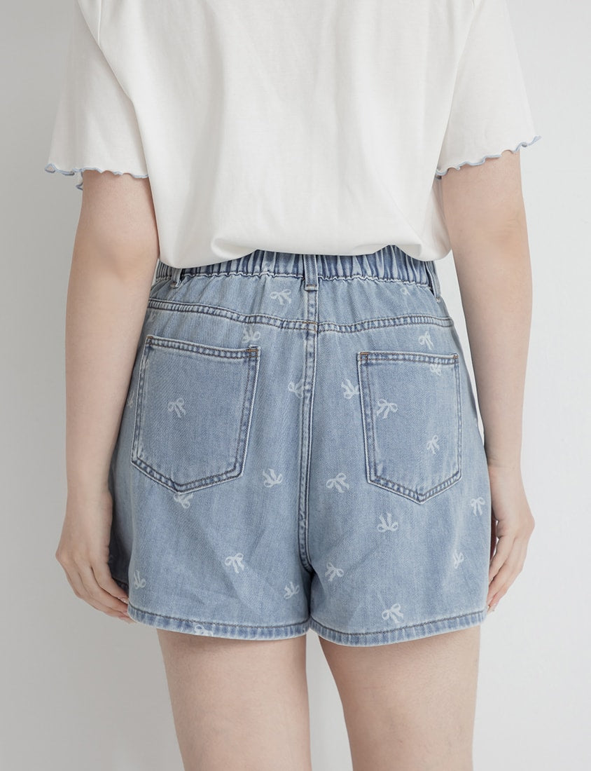 Playful All-Over Bow Plus Size Denim Shorts