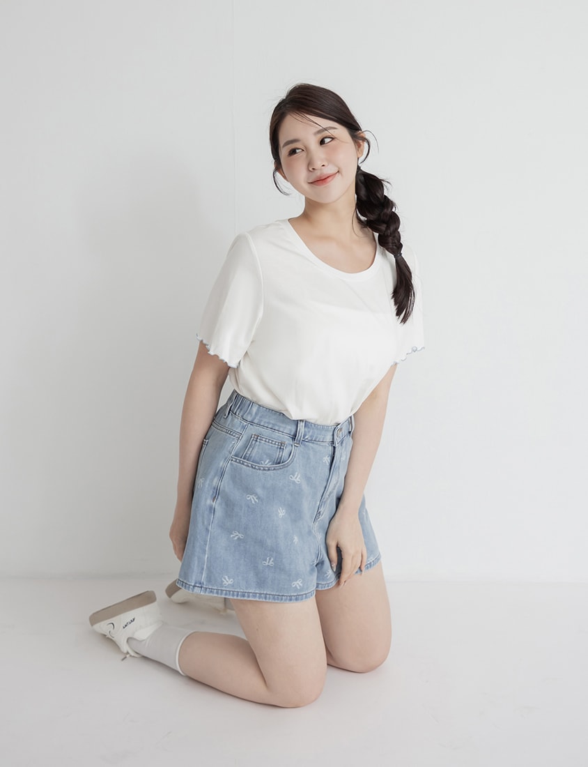 Playful All-Over Bow Plus Size Denim Shorts