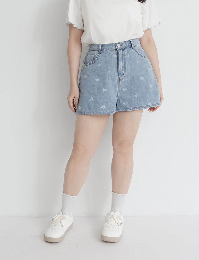 Playful All-Over Bow Plus Size Denim Shorts